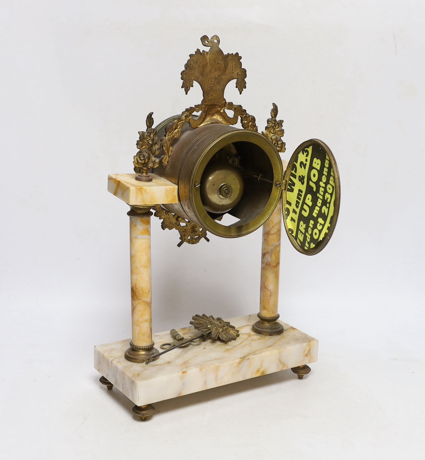 A late 19th century French gilt metal and variegated marble eight day pillar clock, 37cm high